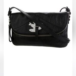 Marc Jacob’s Black crossbody messenger petal to metal bag.